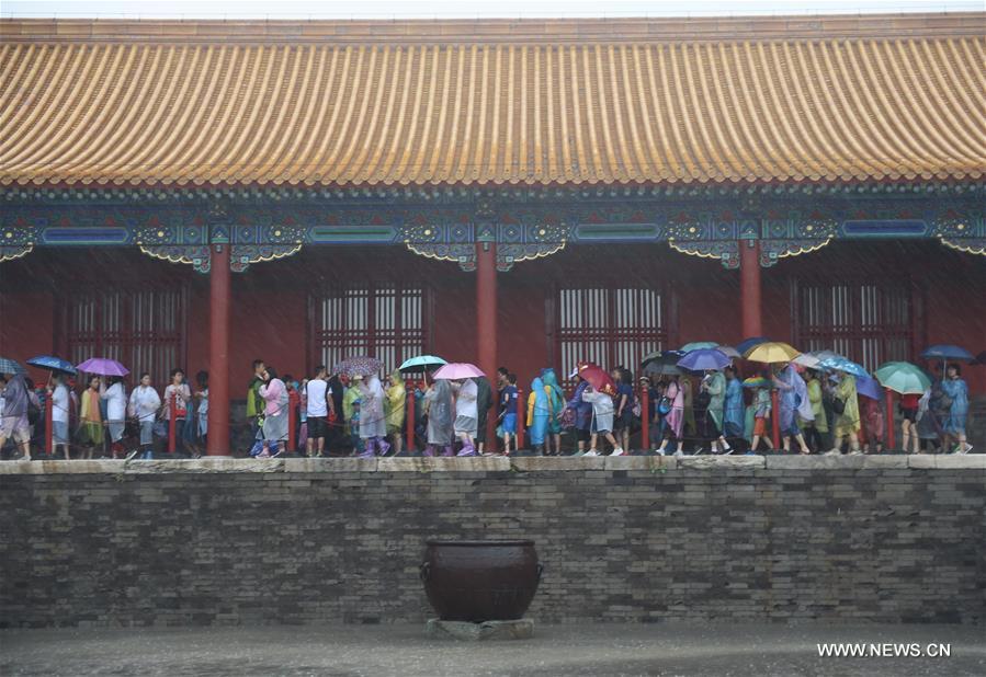 Beijing issues orange alert for rainstorm (1/9)