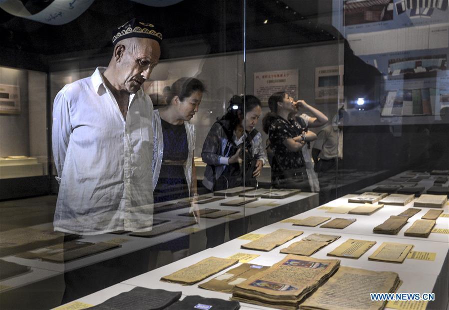 Ancient books, documents of ethnic minorities in China displayed in Xinjiang(1/7)
