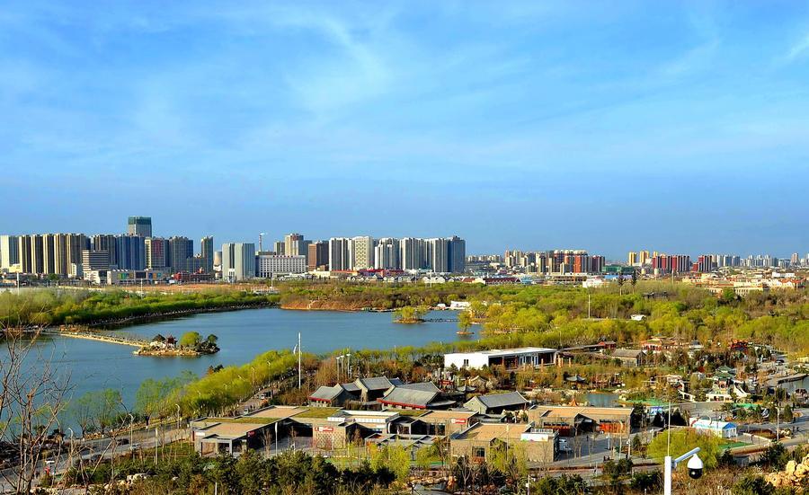 Tangshan builds miracle on debris after quake(2/5)