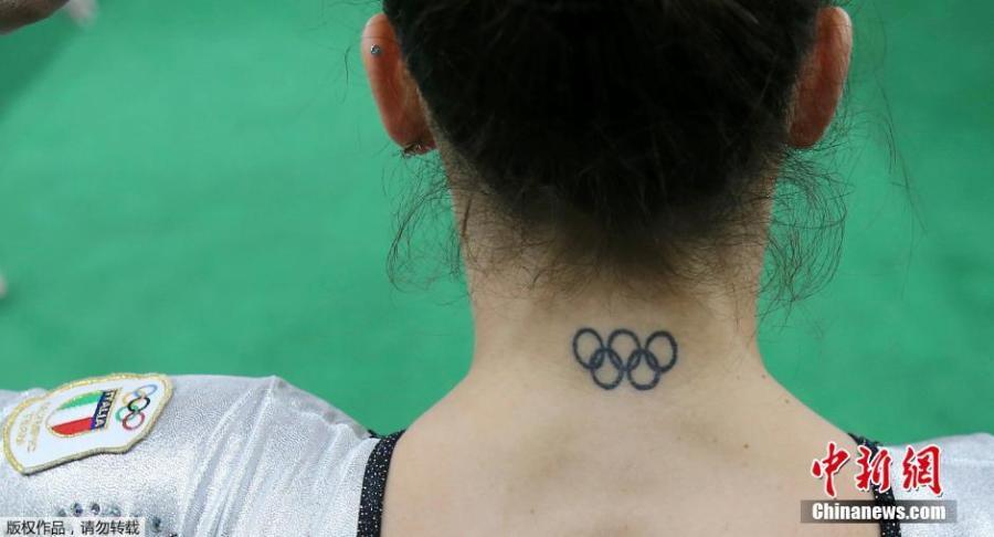 Athletes at the Olympics flaunt tattoos (1/12)