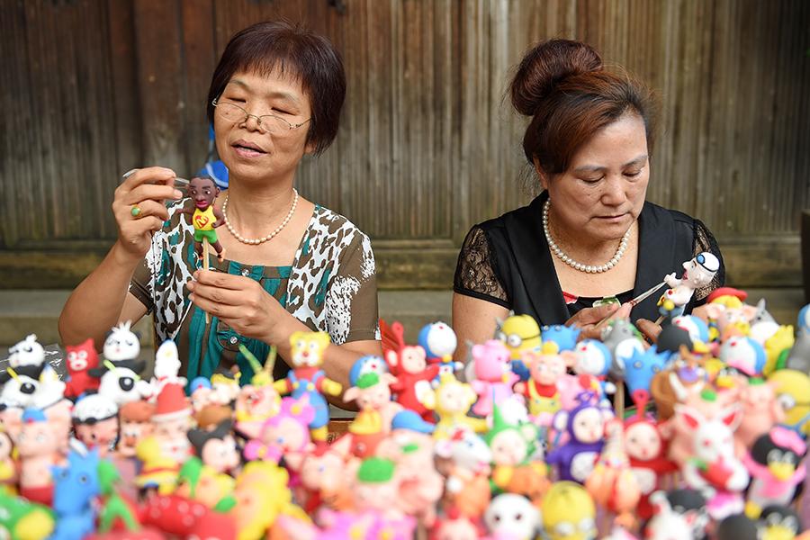 Dough figurine artists create mini Olympic stars(1/5)