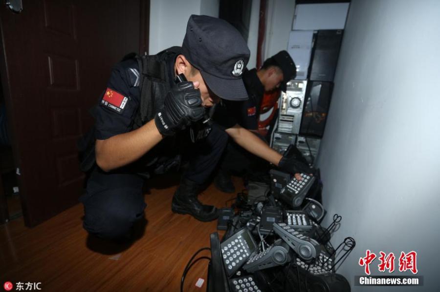 Police arrest 150 telecom fraud suspects in joint mission (1/3)