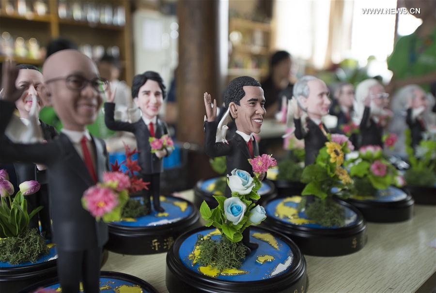 Clay figures featuring leaders to attend G20 Summit seen in Hangzhou(1/3)