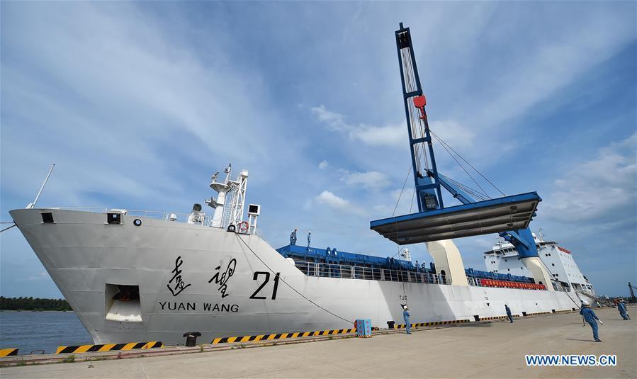 Long March-5 rocket unloaded from ship at Qinglan Port in Hainan(1/2)