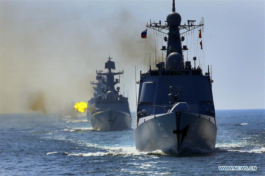Chinese and Russian fleets fire main guns during a China-Russia naval joint drill at sea off south China\'s Guangdong Province, Sept. 18, 2016. Chinese and Russian fleets conducted weapon use on a sea area east of Zhanjiang in south China\'s Guangdong Province during the \