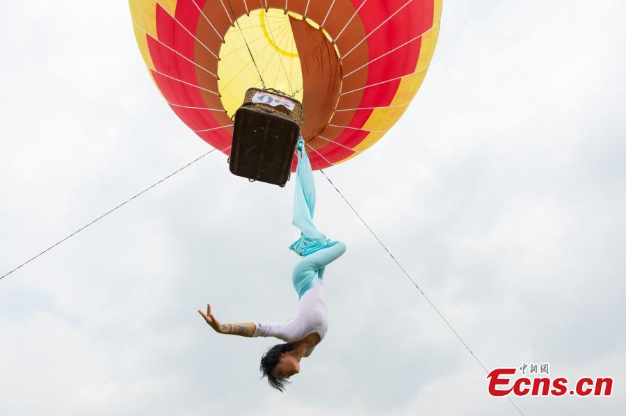 Yoga performance in air celebrates opening of flight camp (1/6)