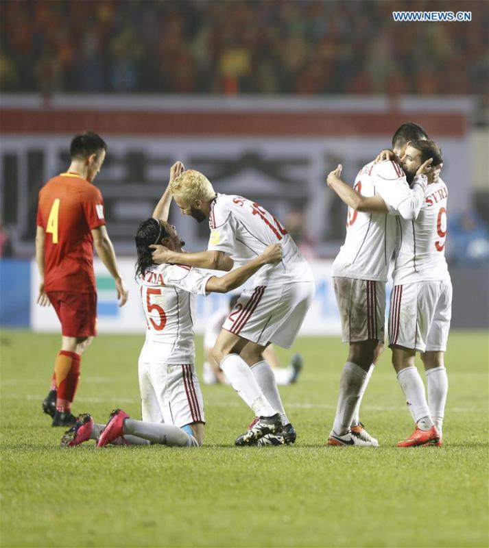 China's World Cup bid hit by Syrian strike(1/3)