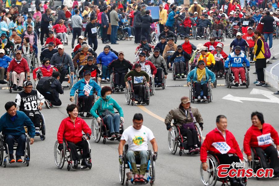 Beijing encourages the disabled to be connected(1/4)