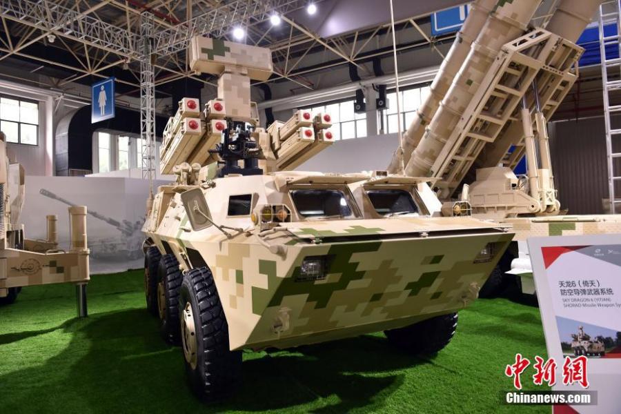 Military equipments are shown at Airshow China 2016 in Zhuhai, South China\'s Guangdong Province on October 31, 2016. The six-day event, commonly known as the Zhuhai Air Show starts on Tuesday and is set to feature some of the best equipment that the People\'s Liberation Army and State-owned defense giants have to offer. Products on show at the biennial event, which is the largest arms exhibition in China, will include the latest offerings in the space, aviation, electronics and land armament industries. Fighter jets, transport planes, drones, missiles, tanks and artillery guns are all set to be on display. (Photo: China News Service/Jin Shuo)