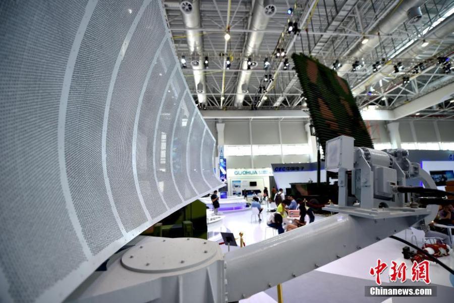 Military equipments are shown at Airshow China 2016 in Zhuhai, South China\'s Guangdong Province on October 31, 2016. The six-day event, commonly known as the Zhuhai Air Show starts on Tuesday and is set to feature some of the best equipment that the People\'s Liberation Army and State-owned defense giants have to offer. Products on show at the biennial event, which is the largest arms exhibition in China, will include the latest offerings in the space, aviation, electronics and land armament industries. Fighter jets, transport planes, drones, missiles, tanks and artillery guns are all set to be on display. (Photo: China News Service/Jin Shuo)