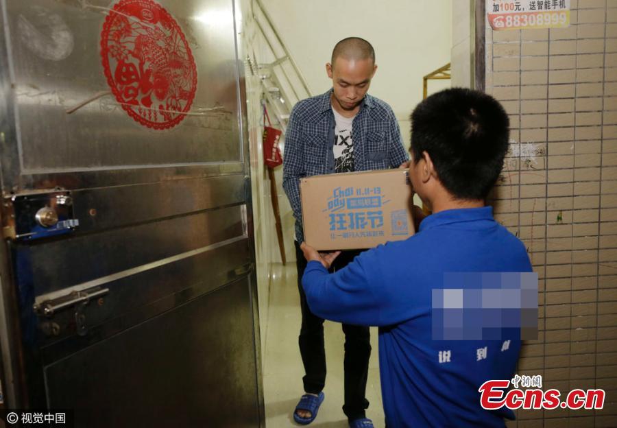 First package from Alibaba's Tmall delivered on Singles Day (1/3)