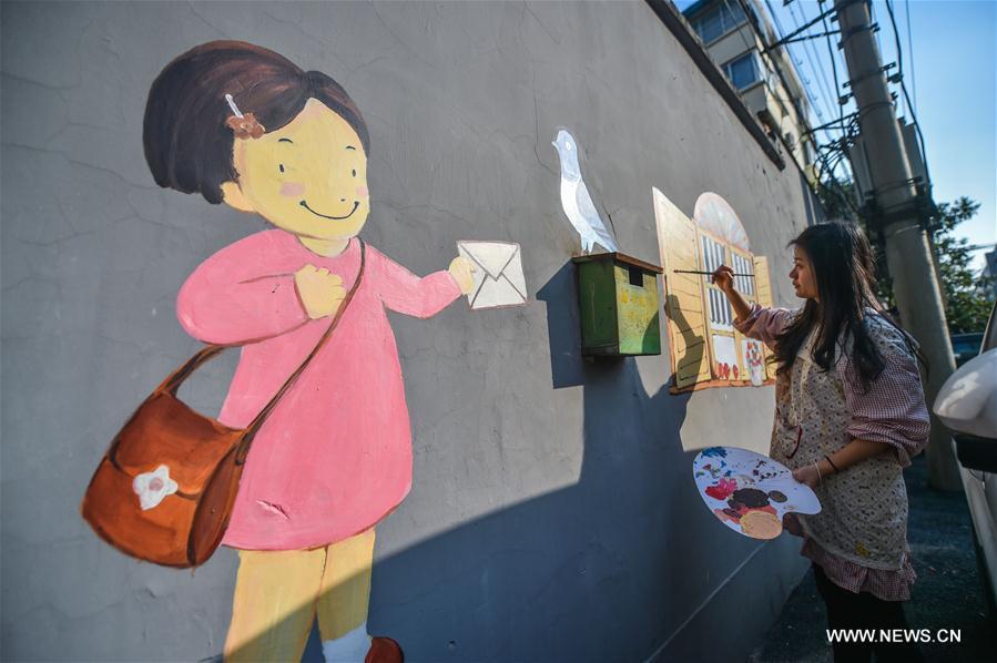 Old neighborhoods decorated with wall paintings in Hangzhou (1/5)