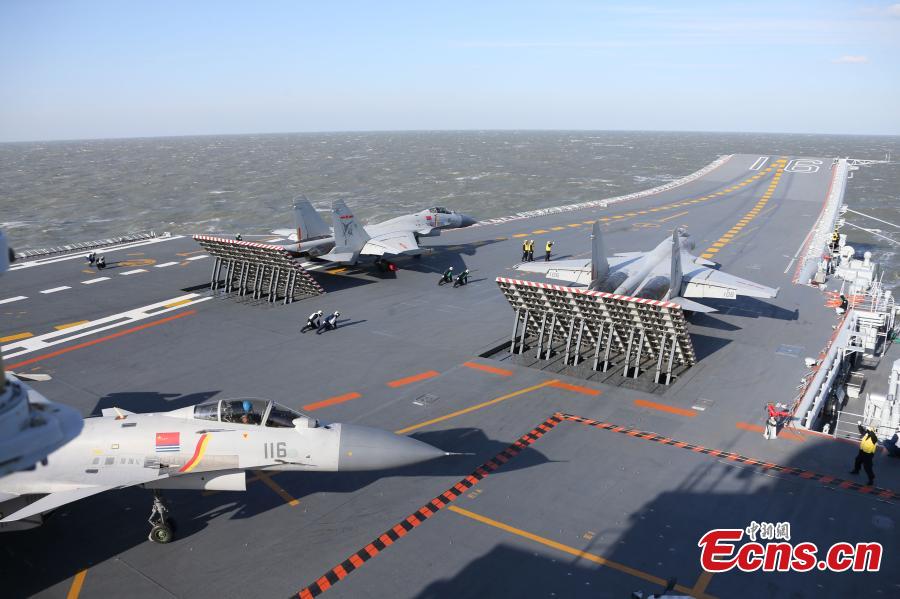 Chinese Navy holds live ammunition drill for aircraft carrier formation (1/8)