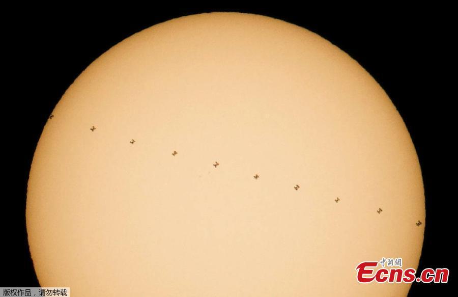 NASA releases image of International Space Station passing in front of sun(1/2)