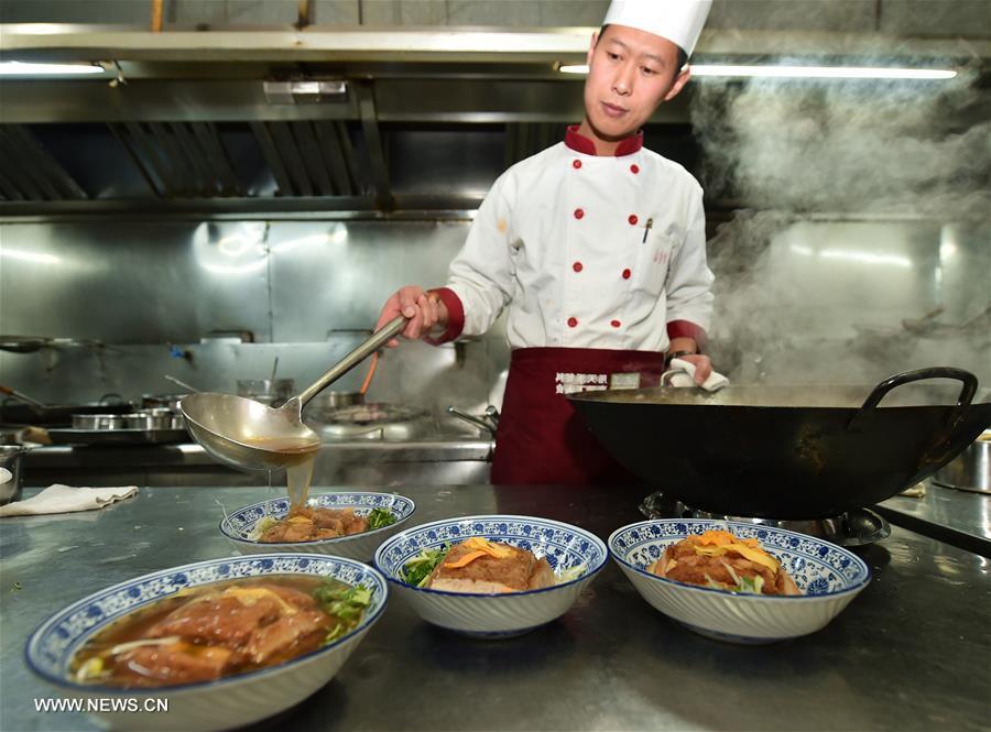 Traditional cuisine cooked for Lunar New Year in N China's Shanxi (1/6)