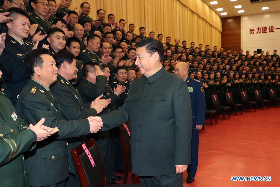 Xi urges continued efforts to build strong military (1/3)