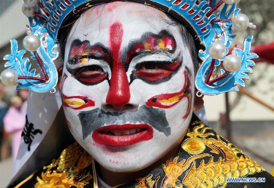 Photo taken on Feb. 8, 2017 shows facial makeup of a shehuo actor in Wudu District of Longnan, northwest China\'s Gansu Province. Shehuo is a type of entertainment popular in Wudu during the Spring Festival. The performance of Shehuo can be traced back to ancient rituals to worship the earth, which they believe could bring good harvests and fortunes in return. (Xinhua/Cai Yang)