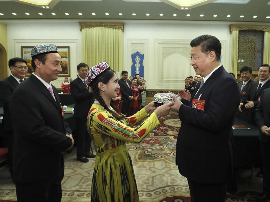 Xi calls for building 'great wall of iron' for Xinjiang's stability (1/6)