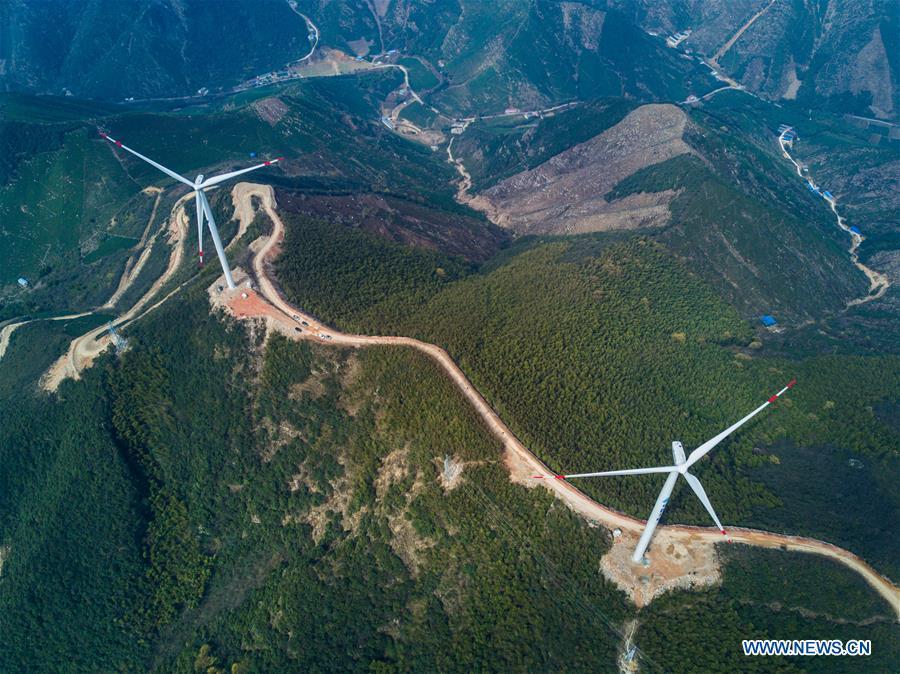 11 wind turbines of power plant officially join power grid in E China(1/4)