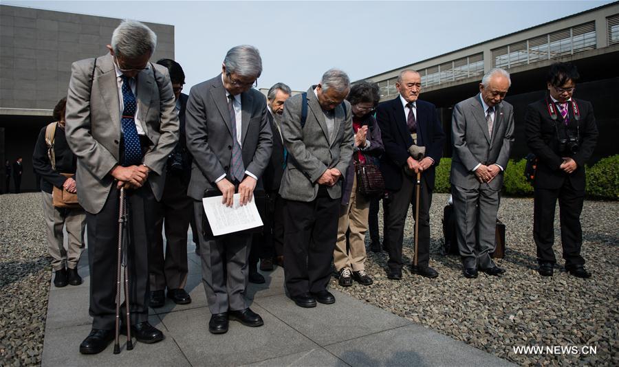 Members of Japanese delegation mourn for victims in Nanjing Massacre(1/7)