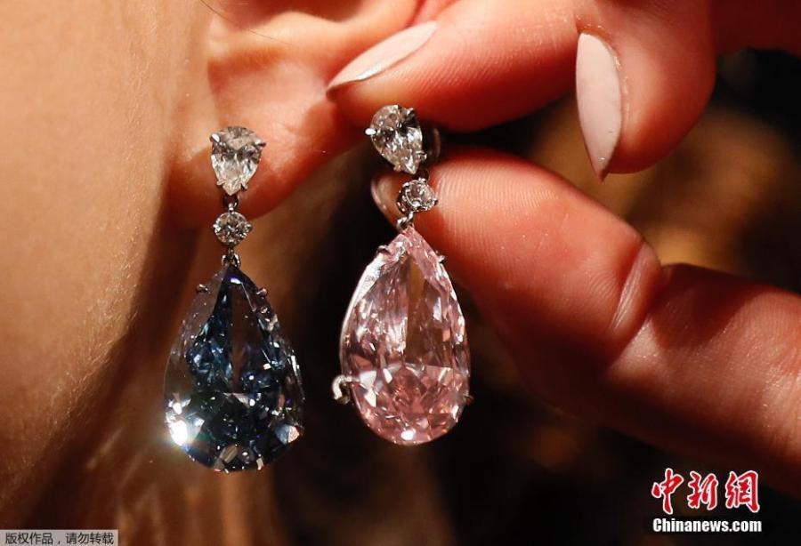 Sparkling diamond earrings seen fetching up to $70 million at auction(1/5)