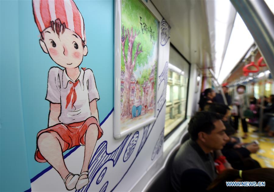 Metro train decorated with animation drawings in Hangzhou(1/8)