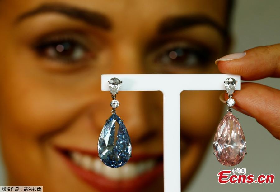 Diamond earrings sell for world record $57.4m(1/5)