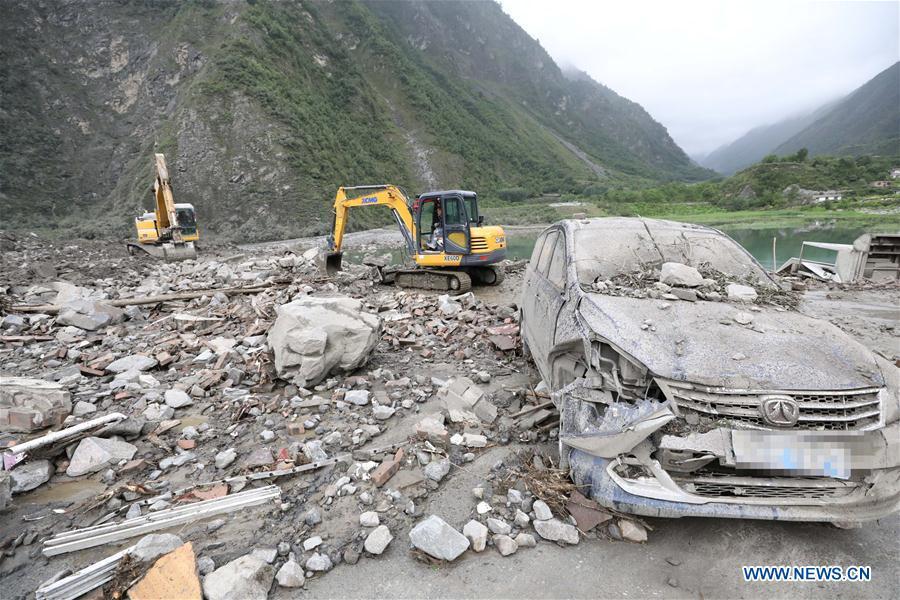 Rescue work underway after SW China's devastated landslide(1/22)