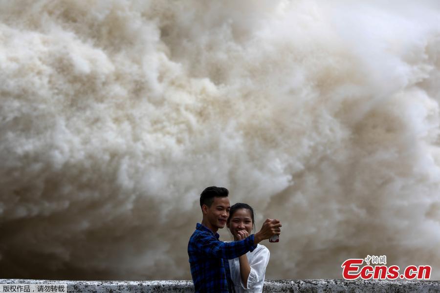 Hydroelectric power plant opens flood gates after rainfall caused by typhoon Talas (1/4)