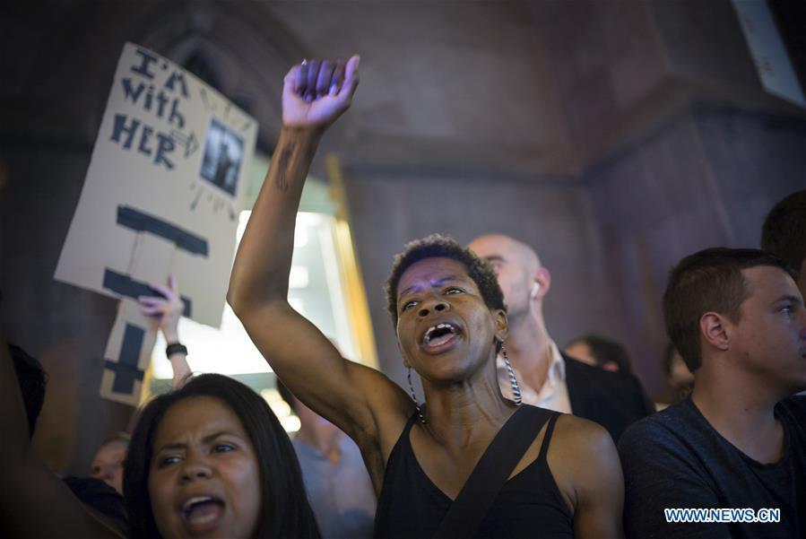 Thousands of protesters crowd streets outside Trump Tower (1/5)