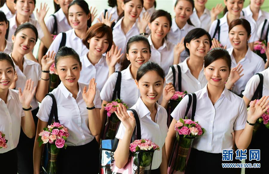 The first batch of Xiamen Airlines Taiwan cabin crew unveiled to the public in Xiamen, Aug 16, 2017. (Photo/Xinhua)