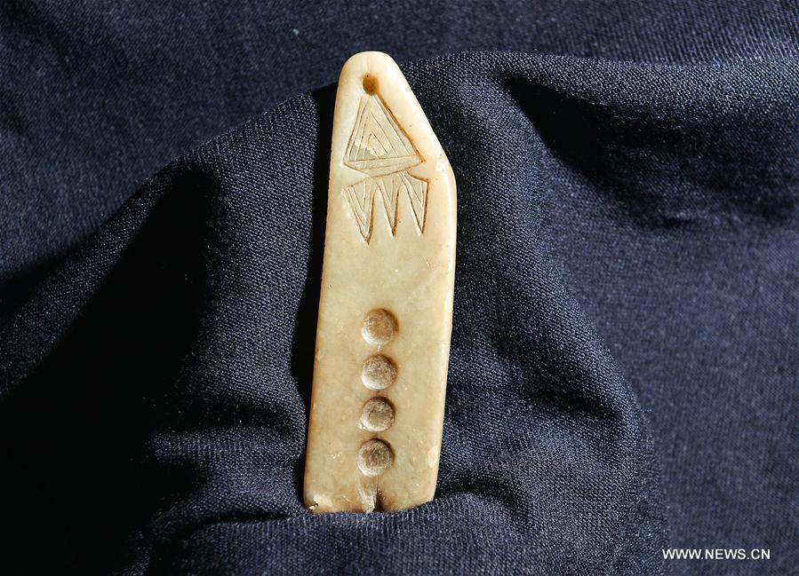 Experts attend symposium in Xinjiang to examine historical settlement(1/8)