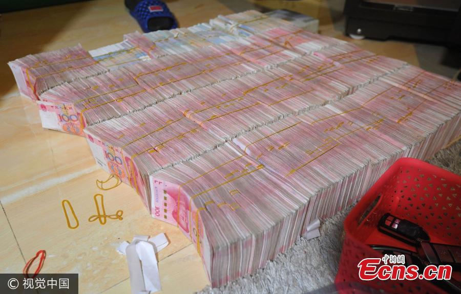 Police bust pyramid scheme involving 8,000 suspects and $228 million(1/4)
