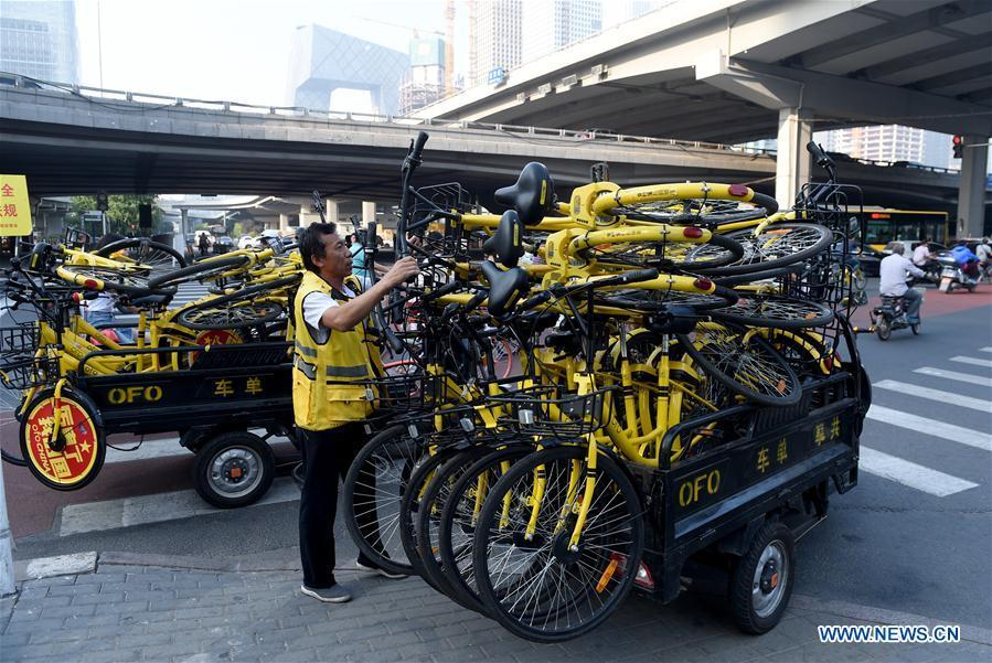 Beijing to ban new addition of shared bikes(1/6)