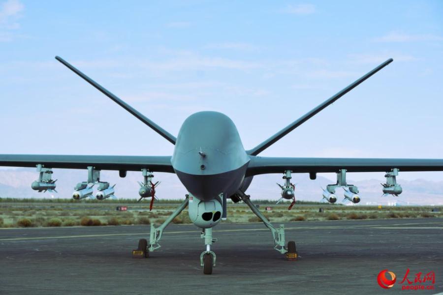China's homemade 'Rainbow 5' drone completes live-fire exercise(1/8)
