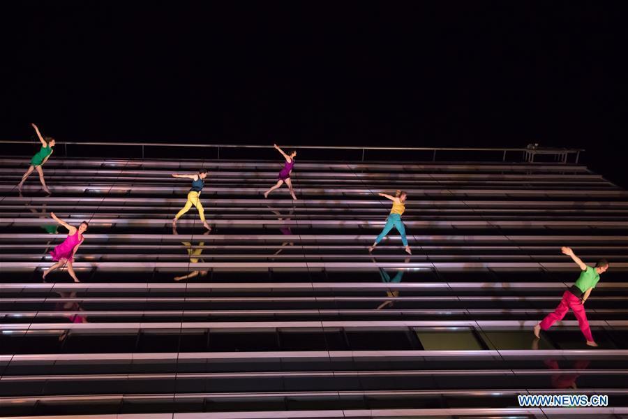 Performance on glass wall of office building in Budapest, Hungary(1/6)