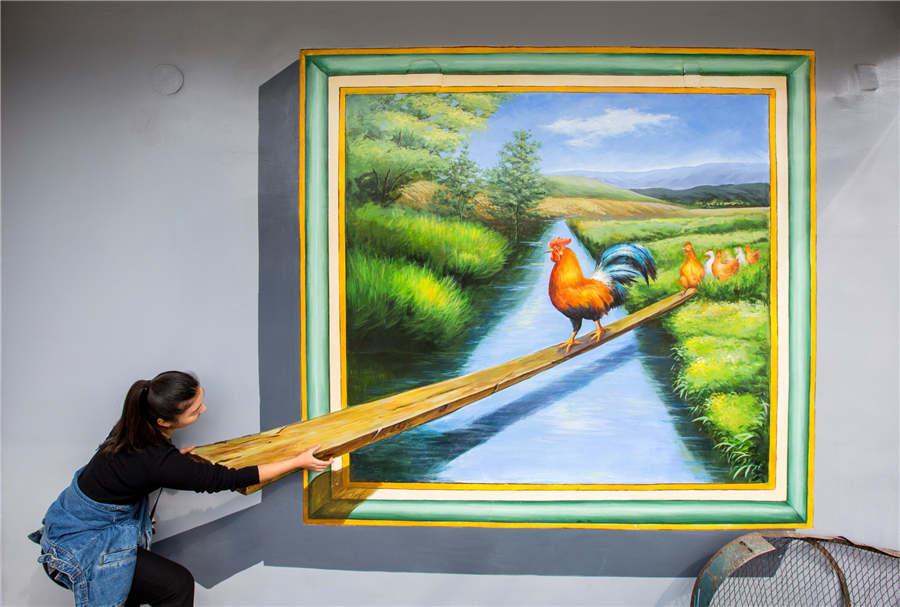 3D paintings dress up Huimin village in Guizhou(1/9)