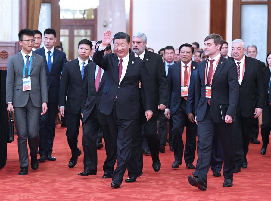 Xi calls on world political parties to build community with shared future for mankind (1/12)