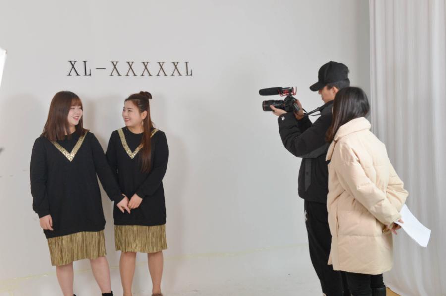 Plus-size models pose for pictures in Hangzhou, Zhejiang province, Dec 28, 2017. Plus-size models are in increasing demand in China amid a boom in the country\'s online shopping, according to Guangzhou Daily. In Hangzhou, capital of East China\'s Zhejiang province, Guo Zhenxing, a 32-year-old Taobao shop owner who sells plus-size clothes, has successively hired nine plus-size models to display clothes for his shop since last March. Guo\'s online shop earned an annual turnover of about 100 million yuan ($15.4 million) last year, but he feels the market has more potential. \