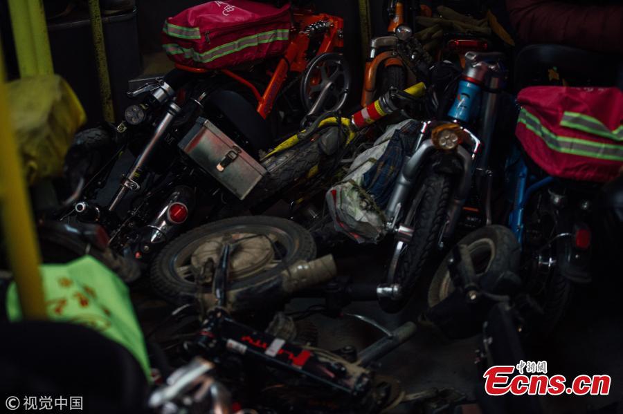 Folding bicycles used by chauffeurs on a bus in Wuhan City, the capital of Central China’s Hubei Province, Feb. 7, 2018. Chauffeurs see an increase in demand for their services as more car owners drink more alcohol at dinners and parties ahead of Spring Festival, China’s Lunar New Year. Chauffeurs usually ride their folding bicycles to restaurants and entertainment venues, pick customers up there, and drive them home in their own cars. Some can earn up to 800 yuan ($120) over one night for the service. (Photo/VCG)