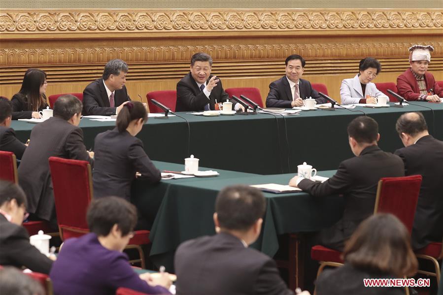 Chinese leaders join national legislators in panel discussions(1/16)