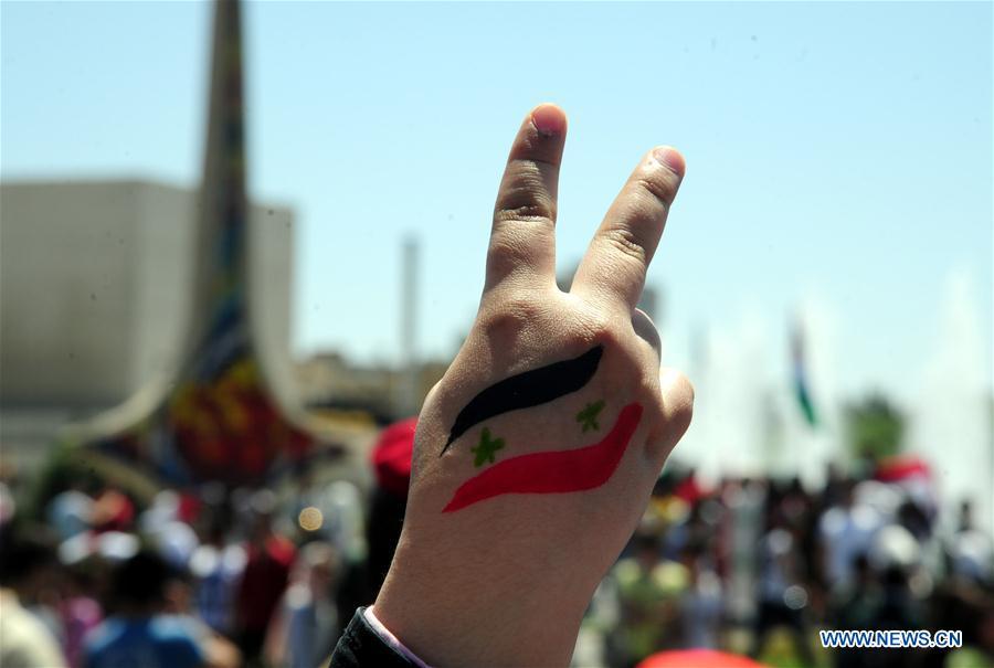 Pro-government rally held in Damascus, Syria(1/4)