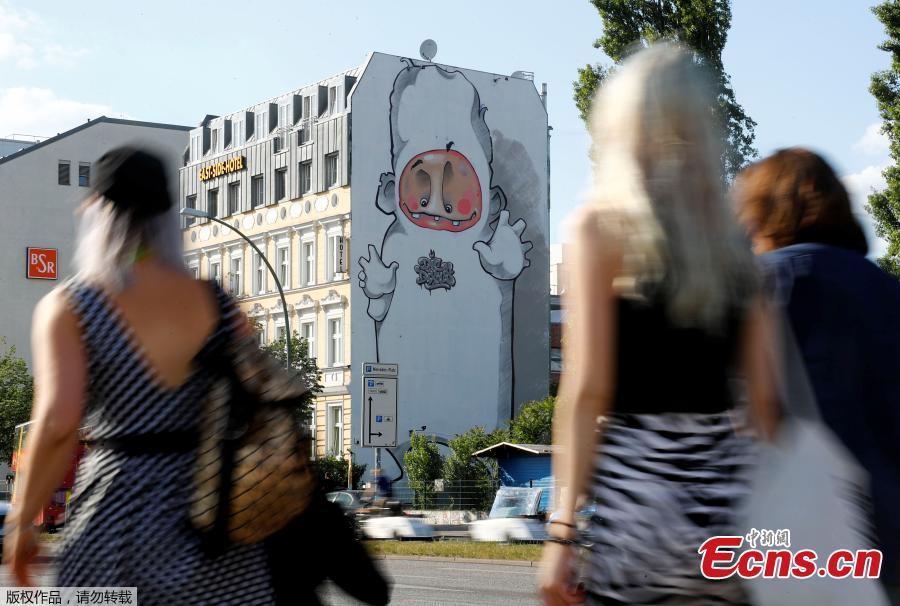 An artwork of urban artists Die Dixons is pictured as part of the first Berlin Mural Fest 2018, where local and international urban artists create a large open-air gallery to enrich urban spaces in Berlin, Germany, May 21, 2018. (Photo/Agencies)
