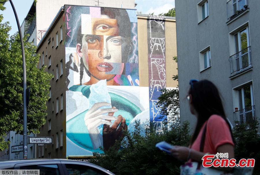 An artwork of urban artist Elle is pictured as part of the first Berlin Mural Fest 2018, where local and international urban artists create a large open-air gallery to enrich urban spaces in Berlin, Germany, May 21, 2018. (Photo/Agencies)