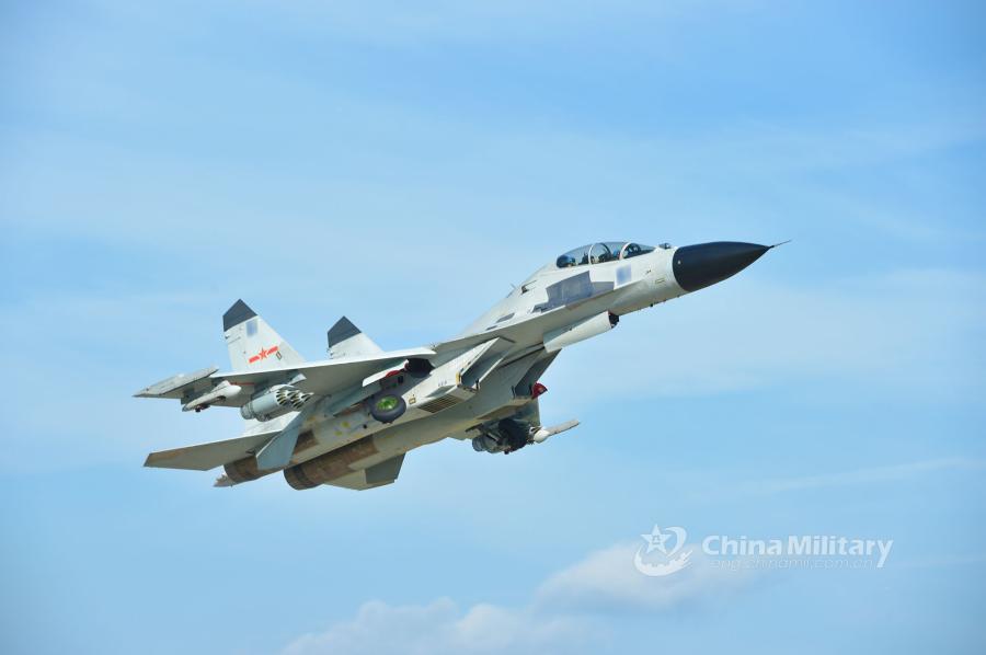 A fighter jet attached to an aviation brigade of the South China Sea Fleet under the PLA Navy takes off for a live-fire training exercise at a shooting range in the South China Sea from May 17 to 18, 2018. (Photo/eng.chinamil.com.cn)
