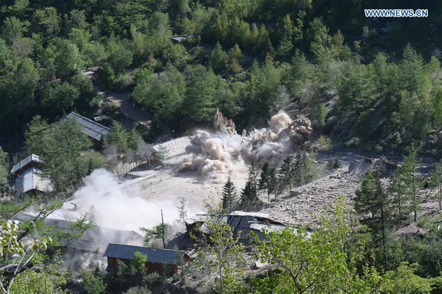 Photo taken on May 24, 2018 shows explosions at the nuclear test site of Punggye-ri, the Democratic People\'s Republic of Korea. The Democratic People\'s Republic of Korea has confirmed the demolition of its nuclear test site at Punggye-ri on Thursday, saying that all the tunnels have been collapsed by explosions and their entrances completely closed, according to the Korean Central News Agency (KCNA). (Xinhua/Cheng Dayu)
Prev 1 2 3 4 5 6