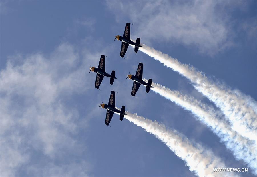 Aerobatics aircrafts perform during a rehearsal for the 10th Air Sports Cultural Tourism Festival in Anyang, central China\'s Henan Province, May 24, 2018. The three-day air show begins on May 25. (Xinhua/Li An)