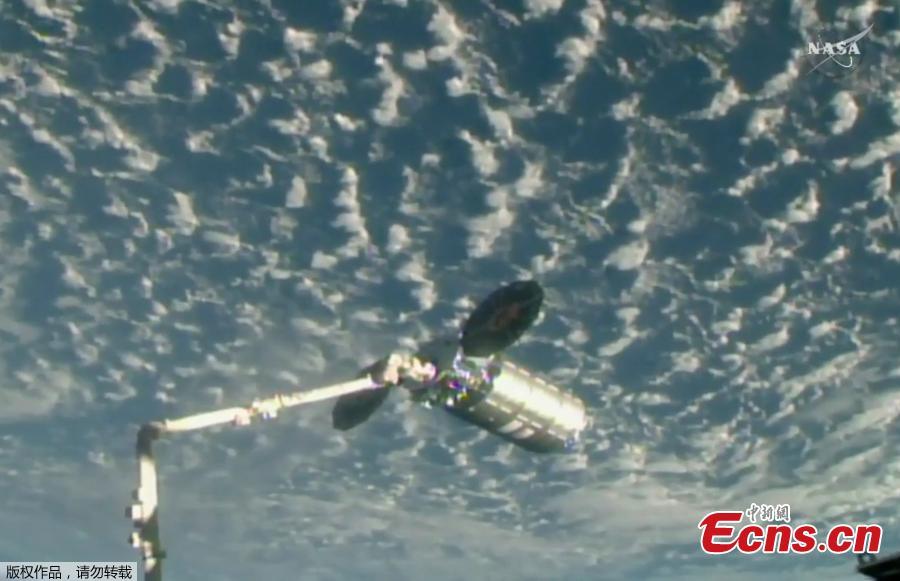 The uncrewed Orbital ATK Cygnus cargo ship S.S. J.R. Thompson is captured by a robotic arm at the International Space Station on May 24, 2018. The Cygnus delivered more than 3 tons of supplies to the station\'s Expedition 55 crew. (Photo/NASA)