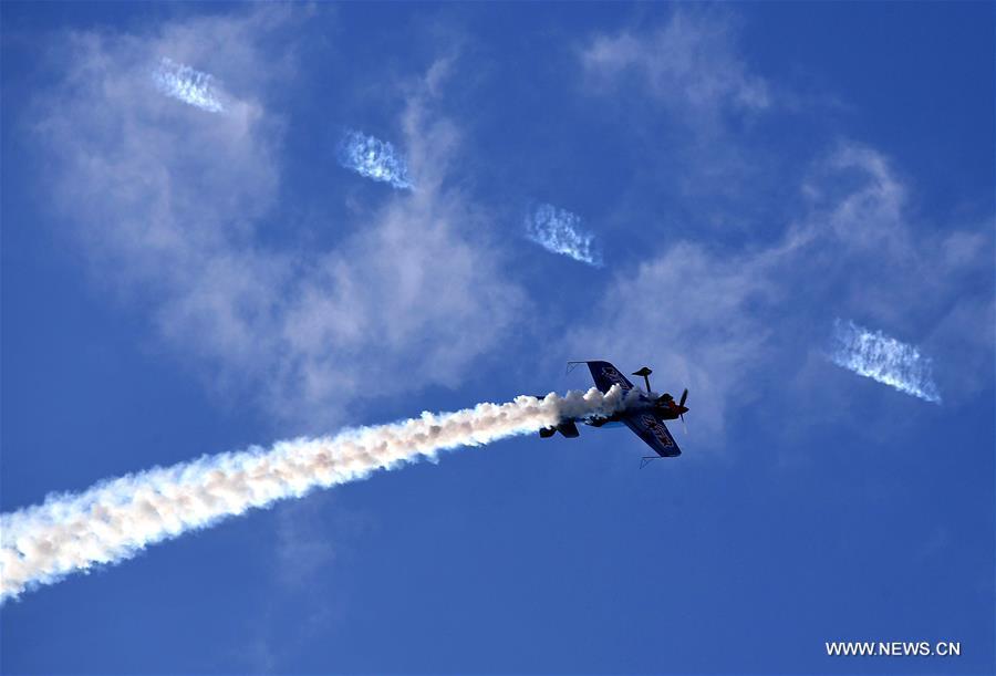 An aerobatics aircraft performs during a rehearsal for the 10th Air Sports Cultural Tourism Festival in Anyang, central China\'s Henan Province, May 24, 2018. The three-day air show begins on May 25. (Xinhua/Li An)