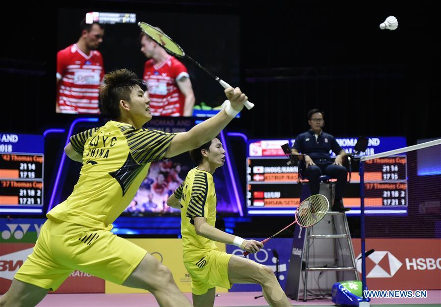 Li Junhui and Liu Yuchen (L) of team China hit a return during the BWF Thomas Cup 2018 semifinal against Mohammad Ahsan and Hendra Setiawan of team Indonesia in Bangkok, Thailand, on May 25, 2018. Team China advanced to the final with 3-1.(Xinhua/Wang Shen)